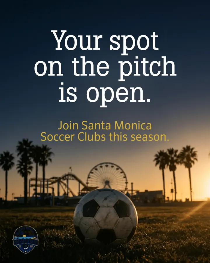 Soccer ball on the grass at sunset with the Santa Monica Pier Ferris wheel behind